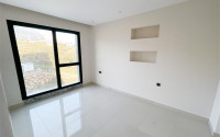 Three-room apartment on the 3rd floor in a new high-rise complex, Mahmutlar district.-id-4153-photo-9
