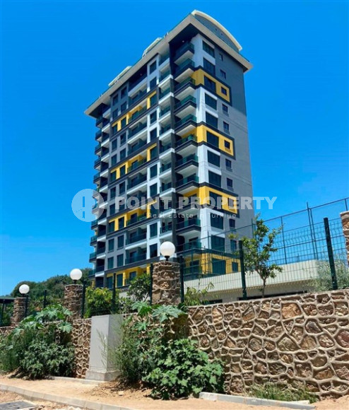 Three-room apartment on the 3rd floor in a new high-rise complex, Mahmutlar district.-id-4153-photo-10