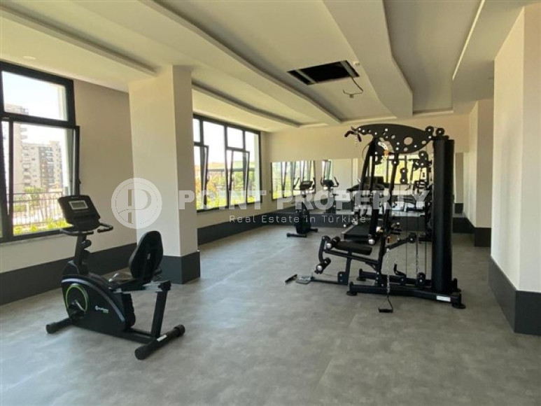 Three-room apartment on the 3rd floor in a new high-rise complex, Mahmutlar district.-id-4153-photo-16