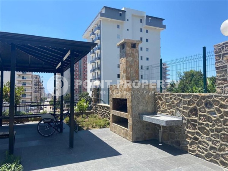 Three-room apartment on the 3rd floor in a new high-rise complex, Mahmutlar district.-id-4153-photo-17