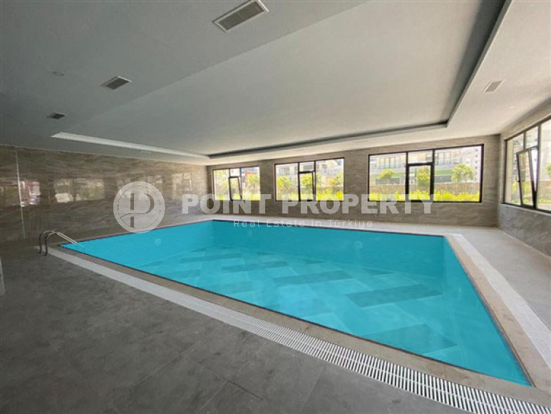 Three-room apartment on the 3rd floor in a new high-rise complex, Mahmutlar district.-id-4153-photo-18