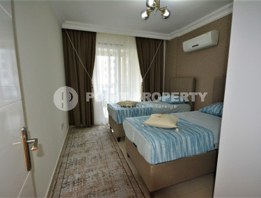 Современные апартаменты 2+1 в 150 метрах от моря в центре спокойного благоустроенного района Кестель.-id-4158-фото-4