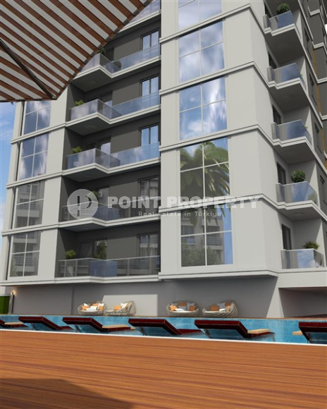 Apartments in a house under construction 800 meters from the sea in the center of Mahmutlar.-id-4161-photo-2