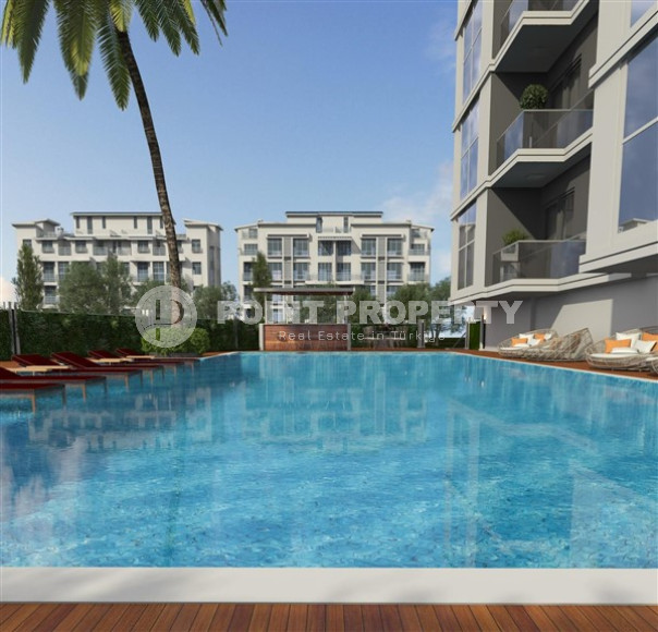 Apartments in a house under construction 800 meters from the sea in the center of Mahmutlar.-id-4161-photo-5