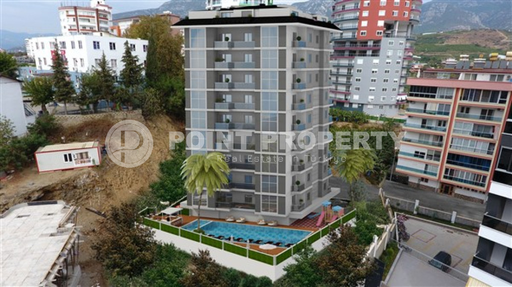 Apartments in a house under construction 800 meters from the sea in the center of Mahmutlar.-id-4161-photo-7