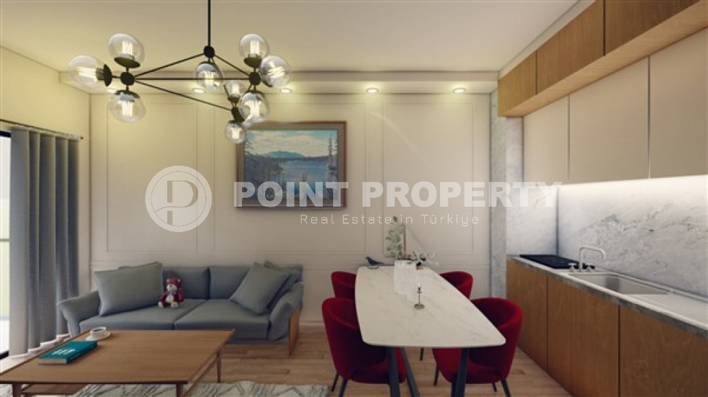 Apartments in a house under construction 800 meters from the sea in the center of Mahmutlar.-id-4161-photo-9