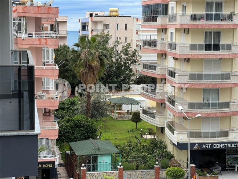 1+1 apartments with fine finishing in a house at the final stage of construction in the center of the popular Mahmutlar area.-id-4162-photo-8