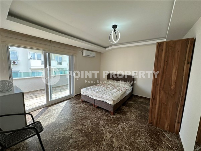 Two-level four-room apartment with furniture on the 11th floor of a high-rise complex in the Mahmutlar area-id-4169-photo-2