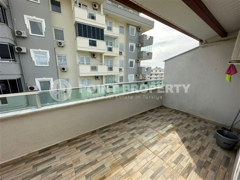 Two-level four-room apartment with furniture on the 11th floor of a high-rise complex in the Mahmutlar area-id-4169-photo-3
