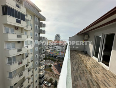 Two-level four-room apartment with furniture on the 11th floor of a high-rise complex in the Mahmutlar area-id-4169-photo-4