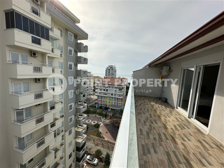 Two-level four-room apartment with furniture on the 11th floor of a high-rise complex in the Mahmutlar area-id-4169-photo-4