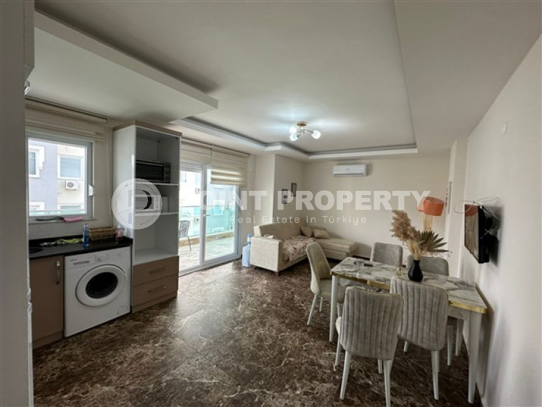 Two-level four-room apartment with furniture on the 11th floor of a high-rise complex in the Mahmutlar area-id-4169-photo-7