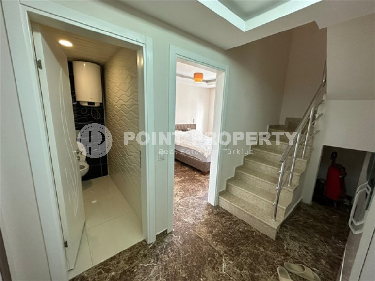 Two-level four-room apartment with furniture on the 11th floor of a high-rise complex in the Mahmutlar area-id-4169-photo-9