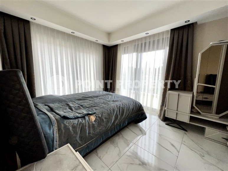 Modern duplex 2+1 on the 4th floor with an attic in a residential complex, commissioned in 2021.-id-4178-photo-4