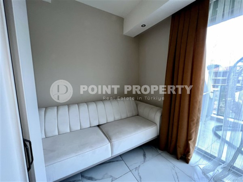 Modern duplex 2+1 on the 4th floor with an attic in a residential complex, commissioned in 2021.-id-4178-photo-5