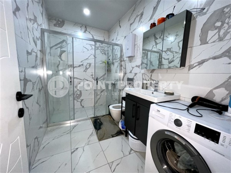 Modern duplex 2+1 on the 4th floor with an attic in a residential complex, commissioned in 2021.-id-4178-photo-6