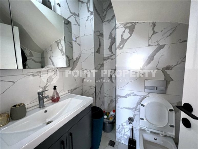 Modern duplex 2+1 on the 4th floor with an attic in a residential complex, commissioned in 2021.-id-4178-photo-7