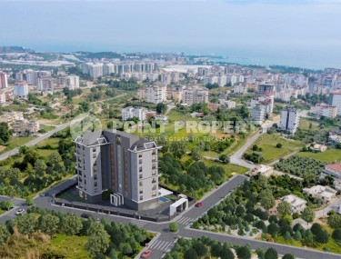 Квартира 1+1 на 3-м этаже в новом жилом комплексе на завершающем этапе строительства в районе Авсаллар.-id-4179-фото-2