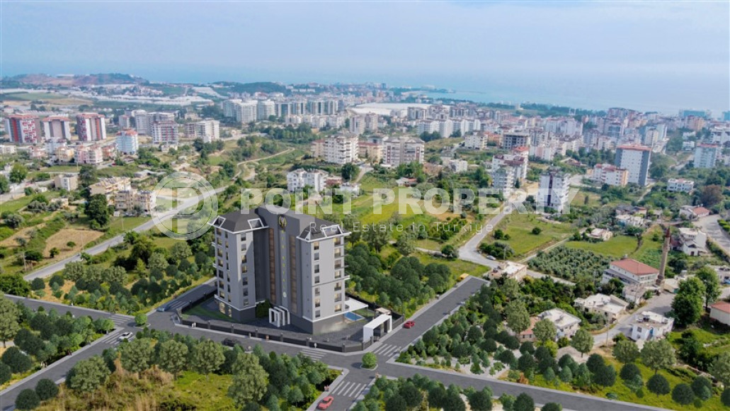 Квартира 1+1 на 3-м этаже в новом жилом комплексе на завершающем этапе строительства в районе Авсаллар.-id-4179-фото-2