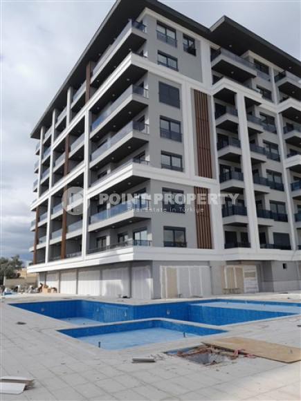 Квартира 1+1 на 3-м этаже в новом жилом комплексе на завершающем этапе строительства в районе Авсаллар.-id-4179-фото-17