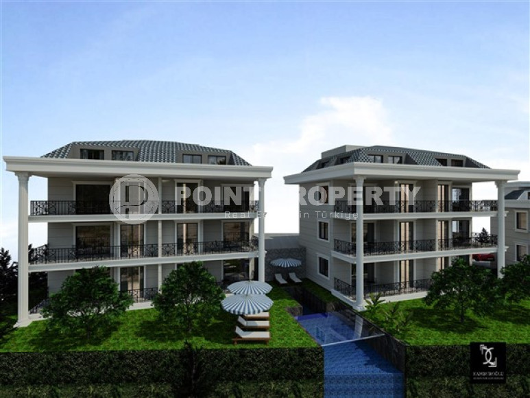 Apartments with different layouts and square footage in a residential complex under construction in the elite Kestel area of Alanya. Description:-id-4181-photo-3