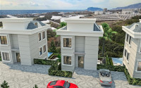 Apartments with different layouts and square footage in a residential complex under construction in the elite Kestel area of Alanya. Description:-id-4181-photo-8