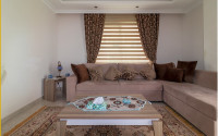 Modern two-bedroom apartment 400 meters from the sea in the popular Mahmutlar area.-id-4182-photo-2