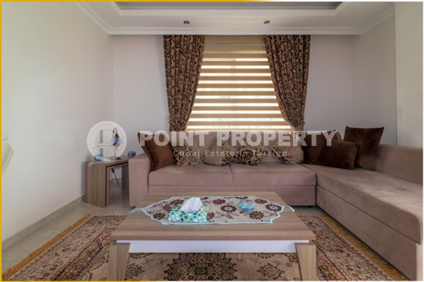 Modern two-bedroom apartment 400 meters from the sea in the popular Mahmutlar area.-id-4182-photo-2
