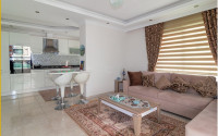 Modern two-bedroom apartment 400 meters from the sea in the popular Mahmutlar area.-id-4182-photo-1