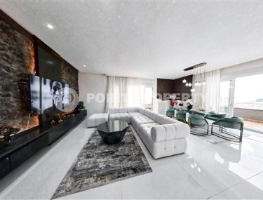 Роскошный триплекс с дизайнерским ремонтом на 9-и и 10-м этажах с мансардой с невероятными панорамными видами на море.-id-4183-фото-1