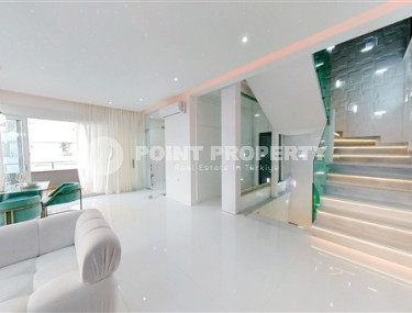 Роскошный триплекс с дизайнерским ремонтом на 9-и и 10-м этажах с мансардой с невероятными панорамными видами на море.-id-4183-фото-2