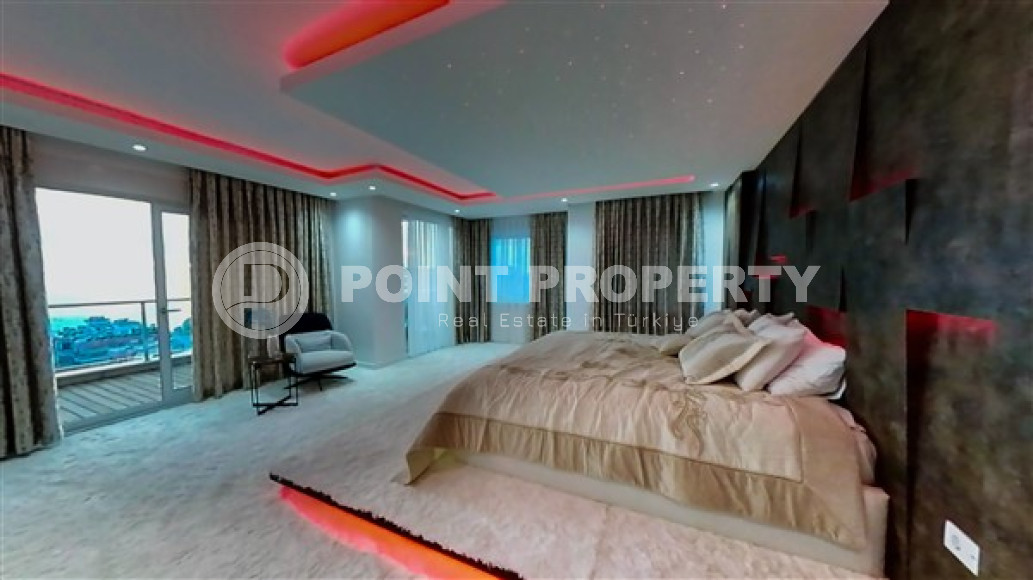 Роскошный триплекс с дизайнерским ремонтом на 9-и и 10-м этажах с мансардой с невероятными панорамными видами на море.-id-4183-фото-11