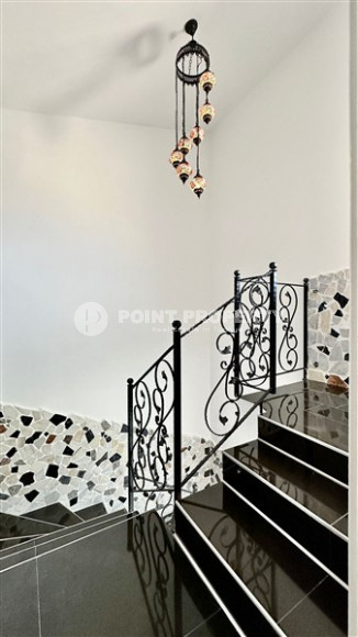 Очаровательная триплексная вилла с площадью 180 м2 и тремя ванными комнатами в районе Демирташ-id-4188-фото-11