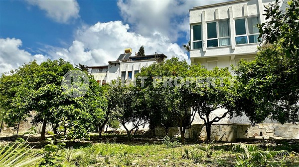 Очаровательная триплексная вилла с площадью 180 м2 и тремя ванными комнатами в районе Демирташ-id-4188-фото-19