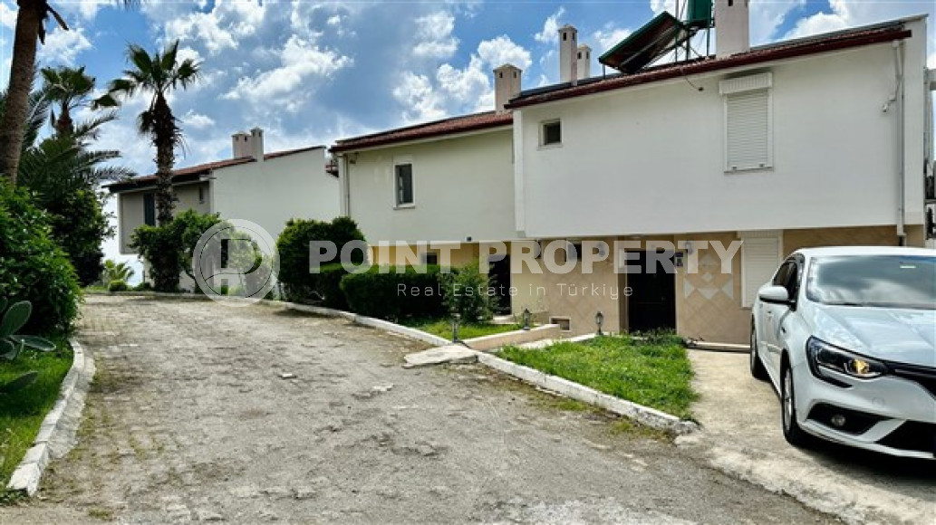 Очаровательная триплексная вилла с площадью 180 м2 и тремя ванными комнатами в районе Демирташ-id-4188-фото-21