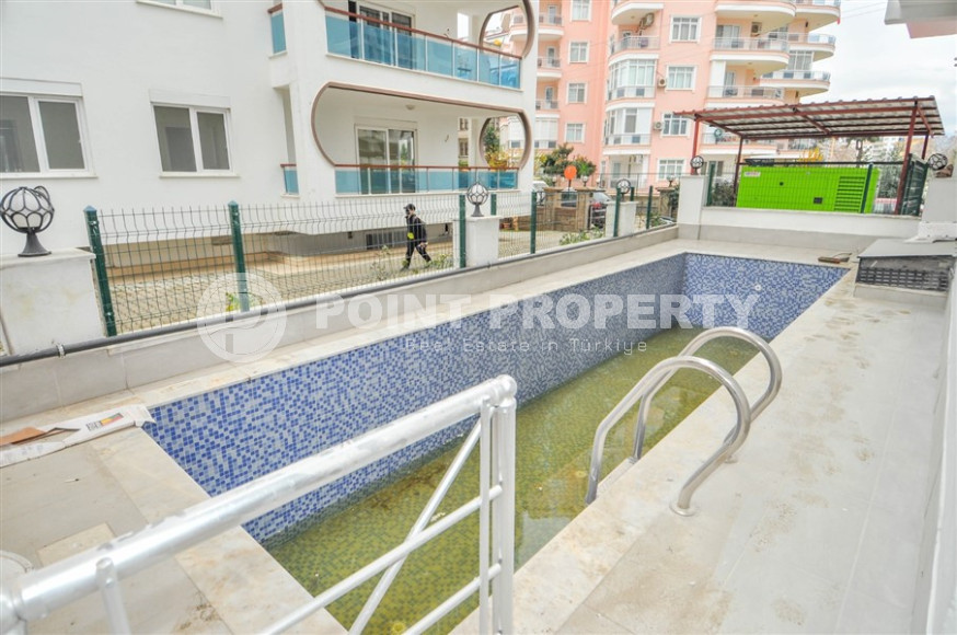 Уютный пентхаус планировкой 1+1 и площадью 55 м2 от собственника в центре Махмутлара, 350 м от моря-id-1344-фото-13