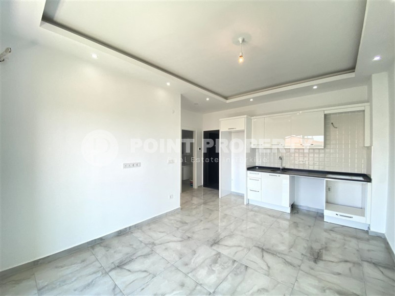 Cozy two-room apartment from the owner with a 1+1 layout and an area of 55 m2 in a new complex in the Oba area-id-1345-photo-3