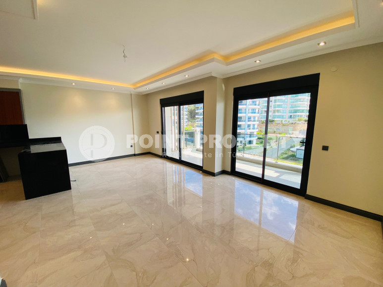 Дуплекс 3+1 с чистовой отделкой на 5-м этаже с мансардой в 300 метрах от моря в элитном районе Аланьи Каргыджак.-id-4196-фото-2