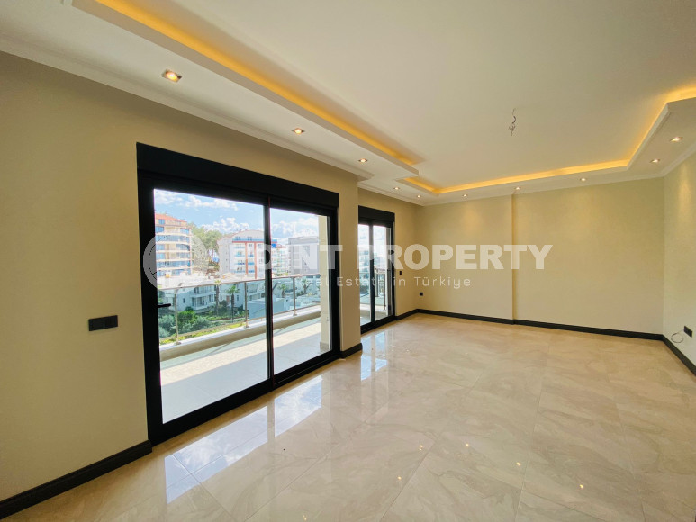 Дуплекс 3+1 с чистовой отделкой на 5-м этаже с мансардой в 300 метрах от моря в элитном районе Аланьи Каргыджак.-id-4196-фото-6