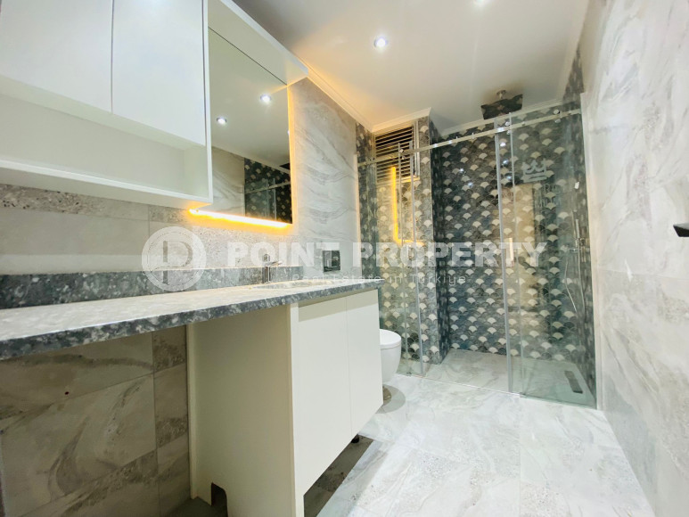 Дуплекс 3+1 с чистовой отделкой на 5-м этаже с мансардой в 300 метрах от моря в элитном районе Аланьи Каргыджак.-id-4196-фото-8