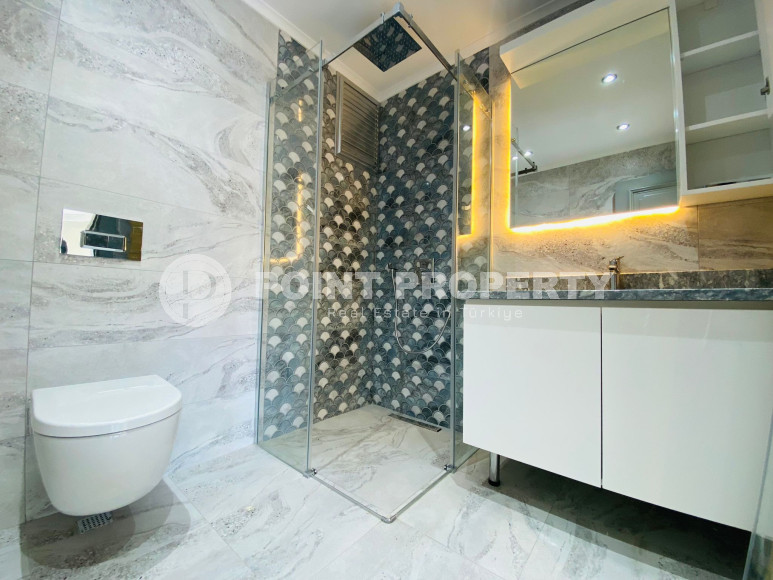 Дуплекс 3+1 с чистовой отделкой на 5-м этаже с мансардой в 300 метрах от моря в элитном районе Аланьи Каргыджак.-id-4196-фото-9