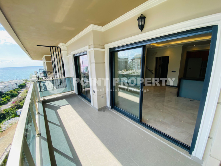 Дуплекс 3+1 с чистовой отделкой на 5-м этаже с мансардой в 300 метрах от моря в элитном районе Аланьи Каргыджак.-id-4196-фото-10