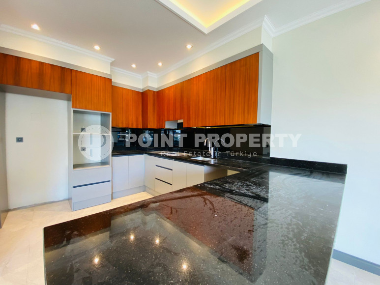 Дуплекс 3+1 с чистовой отделкой на 5-м этаже с мансардой в 300 метрах от моря в элитном районе Аланьи Каргыджак.-id-4196-фото-17