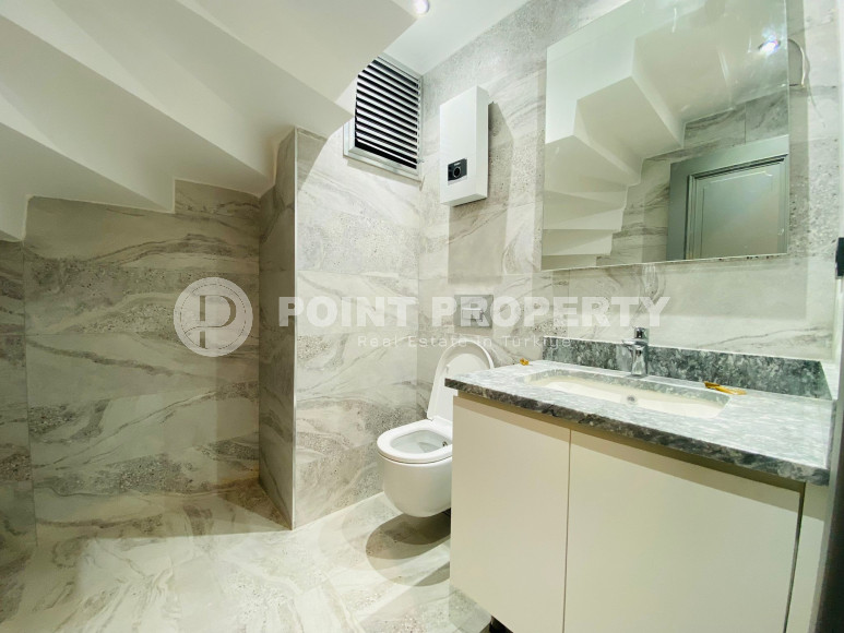 Дуплекс 3+1 с чистовой отделкой на 5-м этаже с мансардой в 300 метрах от моря в элитном районе Аланьи Каргыджак.-id-4196-фото-19