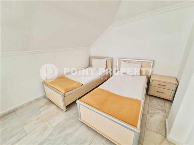 Панорамный дуплекс с четырьмя спальными комнатами на 5-м этаже с мансардой в центре района Оба.-id-4197-фото-6