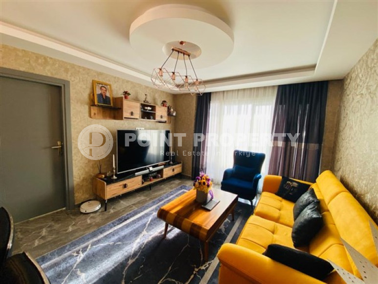 Большая двухуровневая квартира на 11-м этаже с мансардой в центре современного района Махмутлар.-id-4200-фото-2