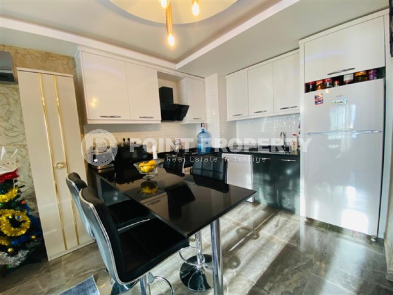 Большая двухуровневая квартира на 11-м этаже с мансардой в центре современного района Махмутлар.-id-4200-фото-3