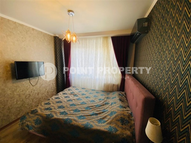 Большая двухуровневая квартира на 11-м этаже с мансардой в центре современного района Махмутлар.-id-4200-фото-5