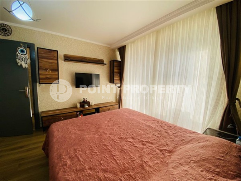 Большая двухуровневая квартира на 11-м этаже с мансардой в центре современного района Махмутлар.-id-4200-фото-7