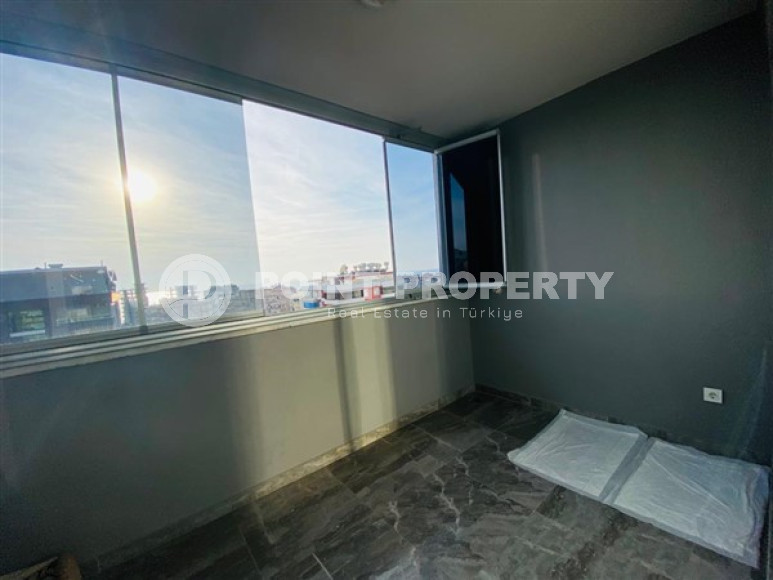 Большая двухуровневая квартира на 11-м этаже с мансардой в центре современного района Махмутлар.-id-4200-фото-11